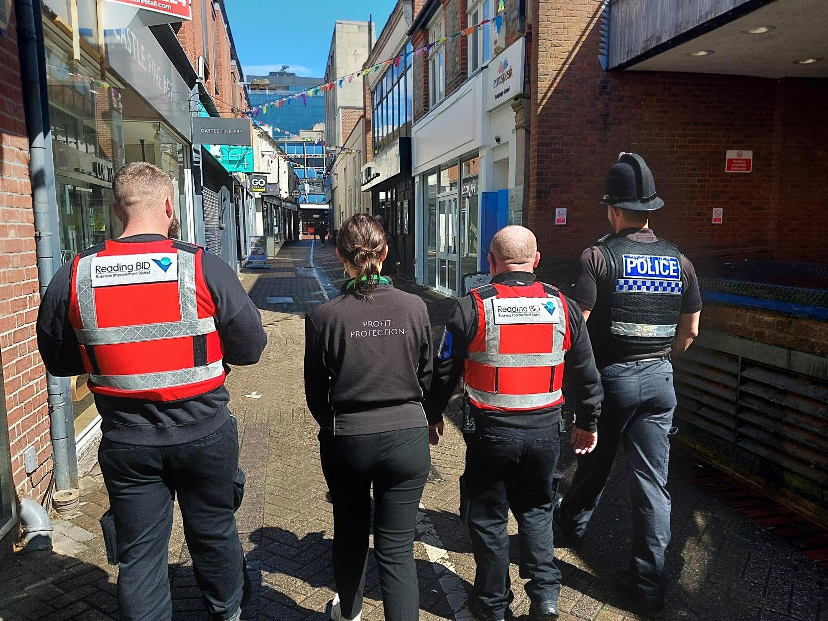 Thames valley police and reading BID walking into Reading Town Centre